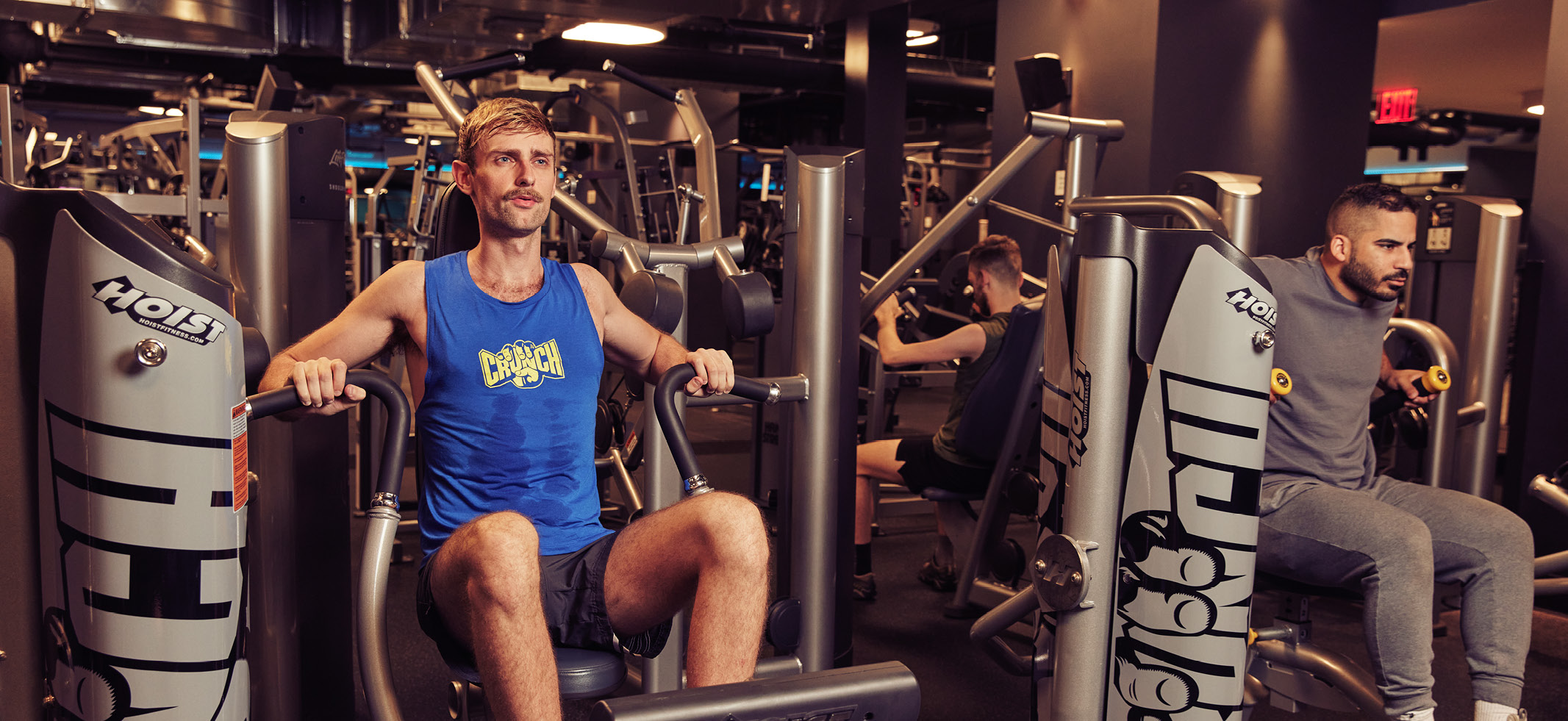 Man on a chest press machine