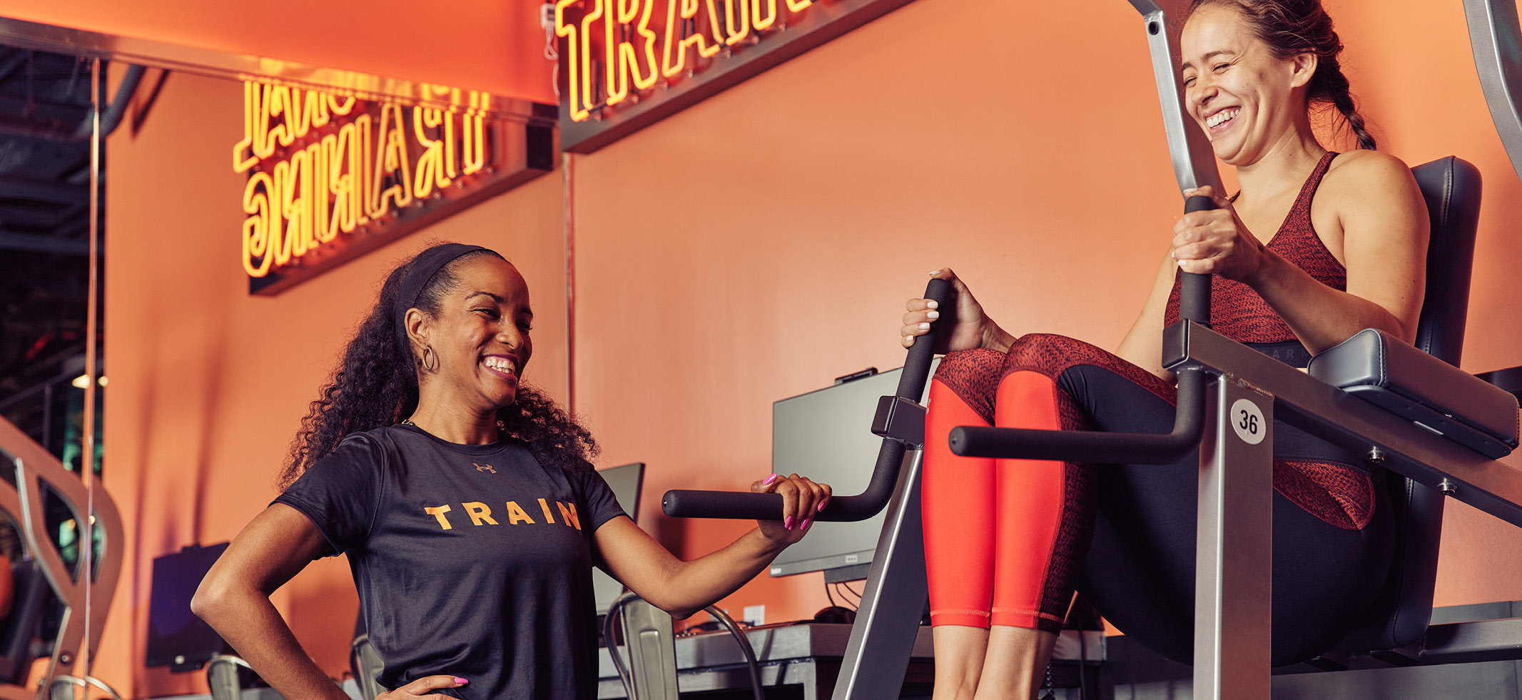 person working out with personal trainer