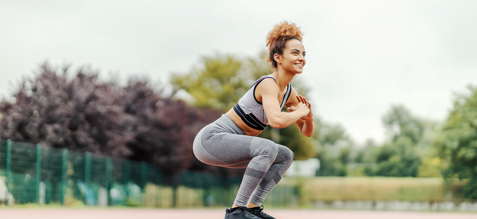 woman hitting a leg workout